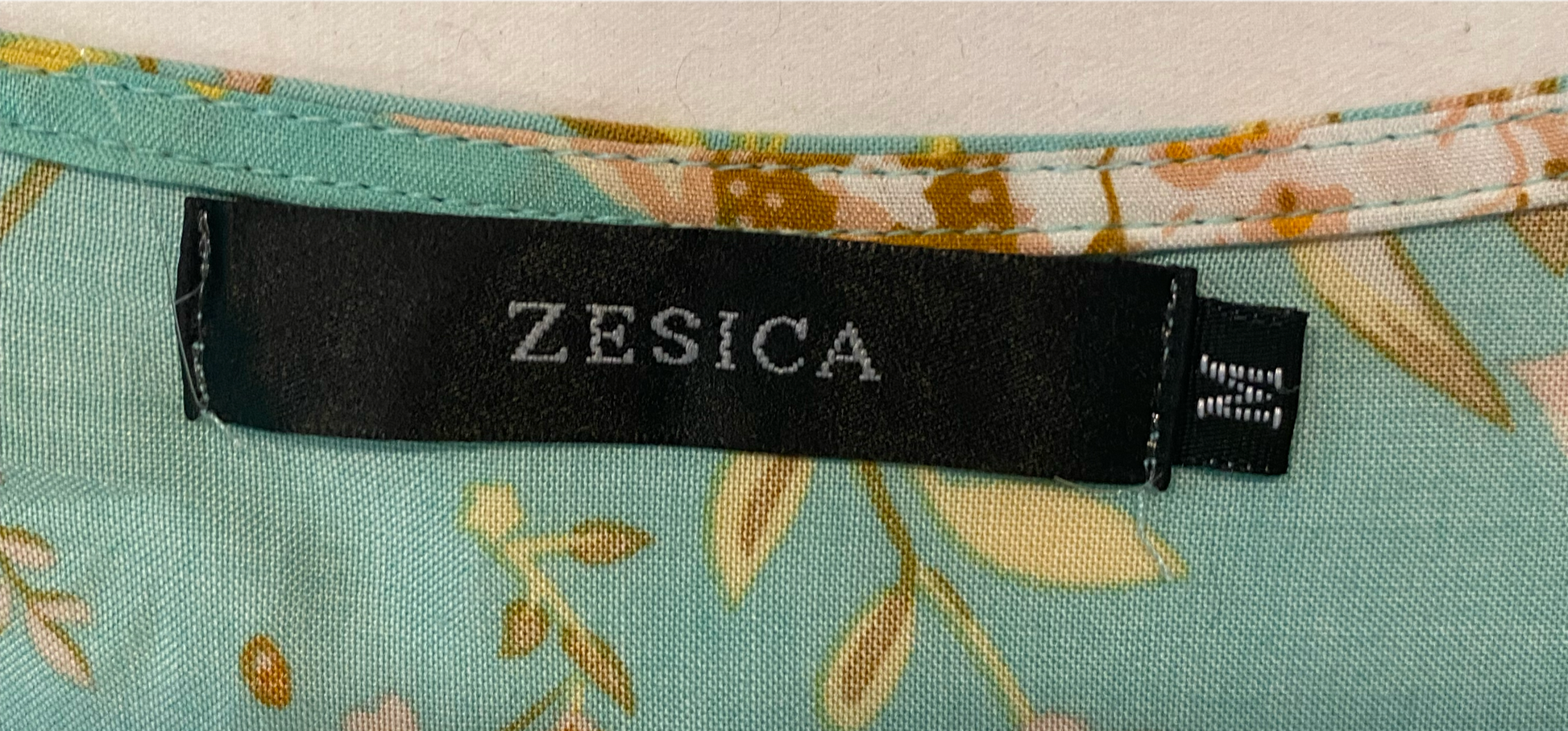 Zesica Short Wrap Dress with Short SleevesGreen wrap dress with rust and cream floral print and ruffle hem.
Bridal shower coming up? Look cute and be comfortable at the same time in this dress!!