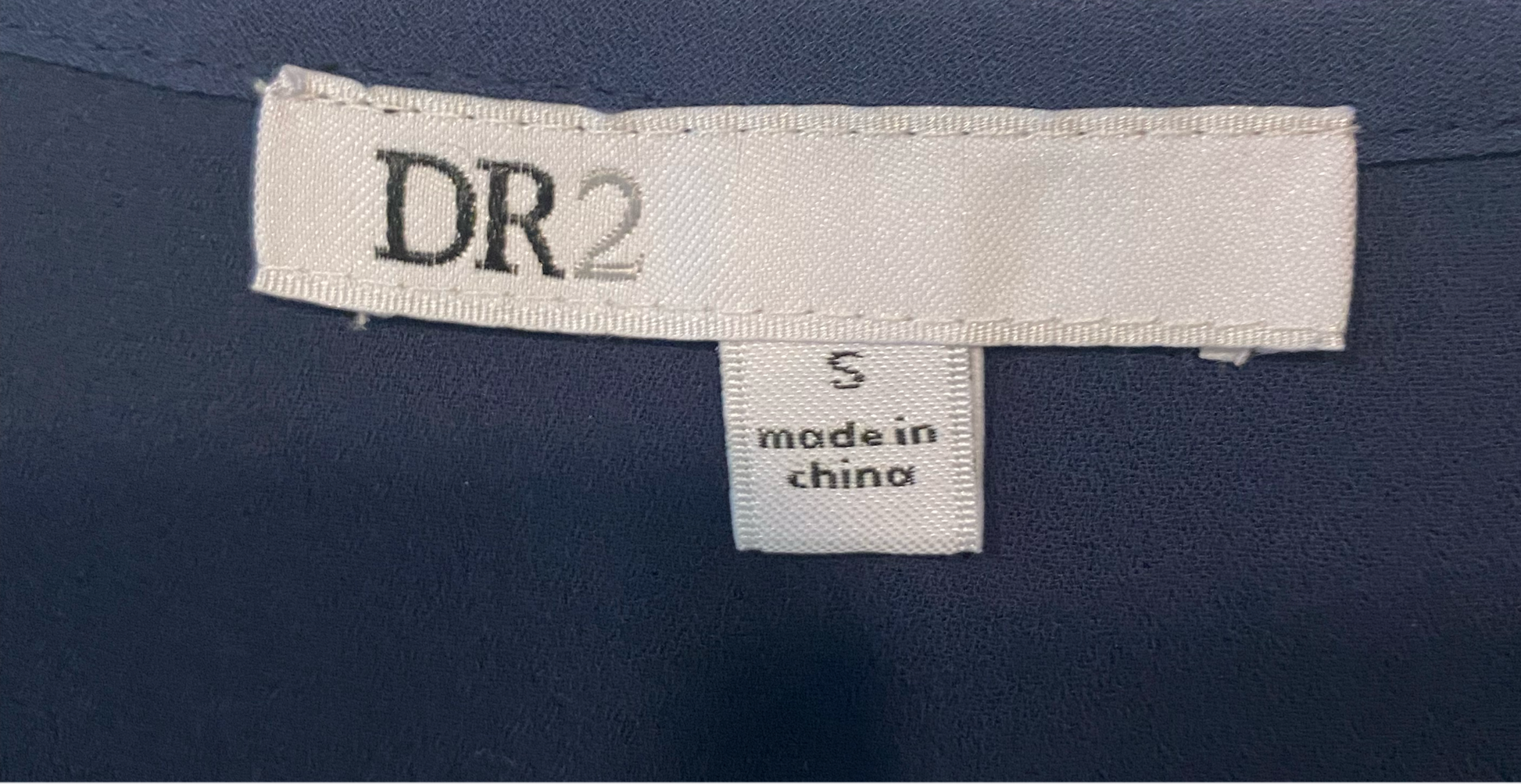 DR2 Navy Blue Short Dress with 3/4 SleevesLight weight navy blue dress with split neck, elastic waist and 3/4 sleeves.
Pair this dress with a brown belt and tall brown boots for a classic Fall look!