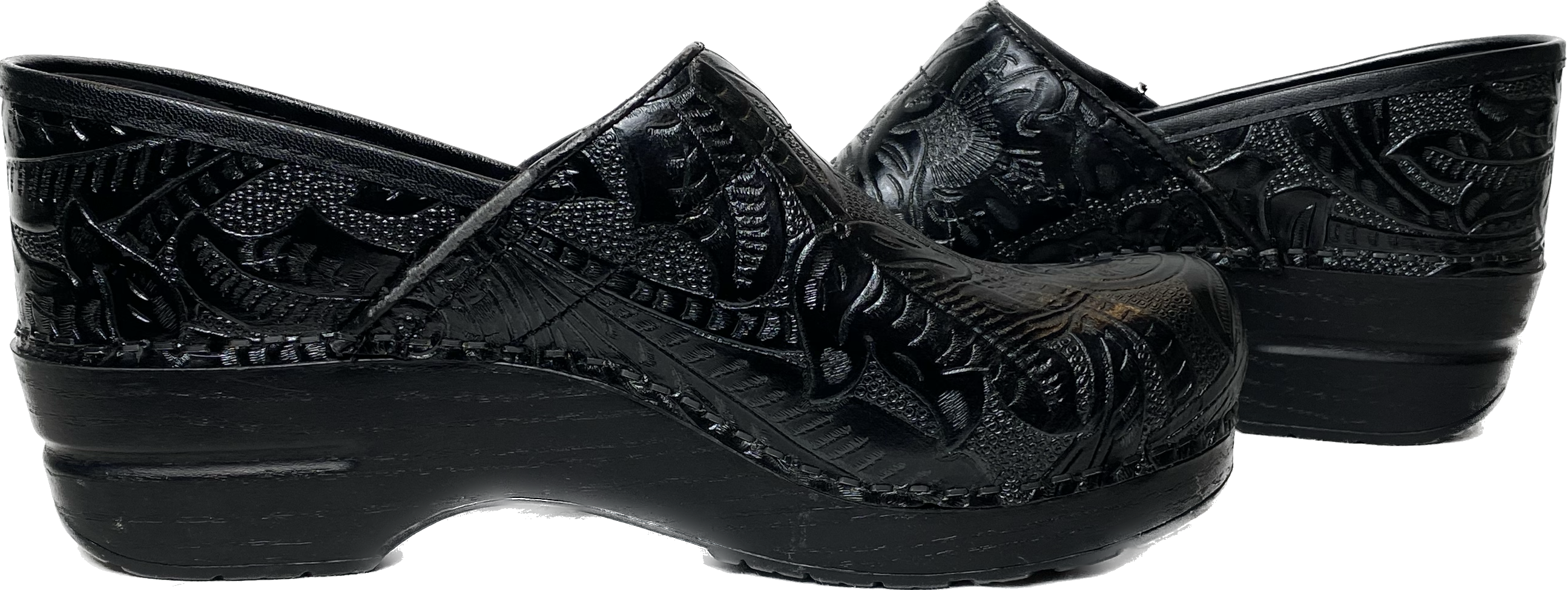 Dansko Professional Black Leather Floral Embossed ClogsThis dansko clog is beautifully embossed with a floral print that will look great with any outfit.