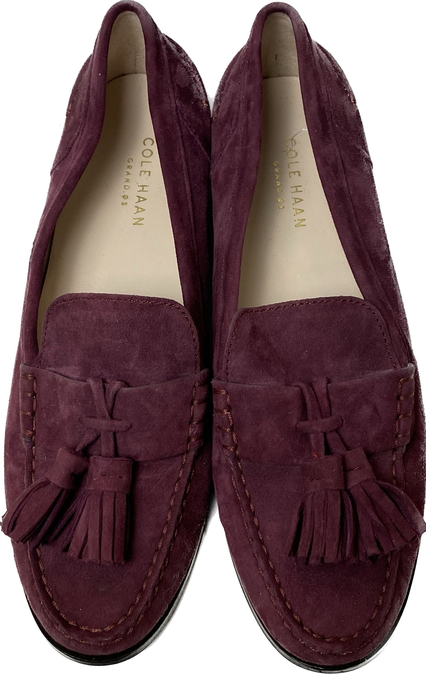 Cole Haan Plum Faux Suede Slip-On Tassel LoafersOn trend plum faux suede tassel loafers. So cute and easy to wear.
Wear these to work with black slacks, and on the go with jeans.