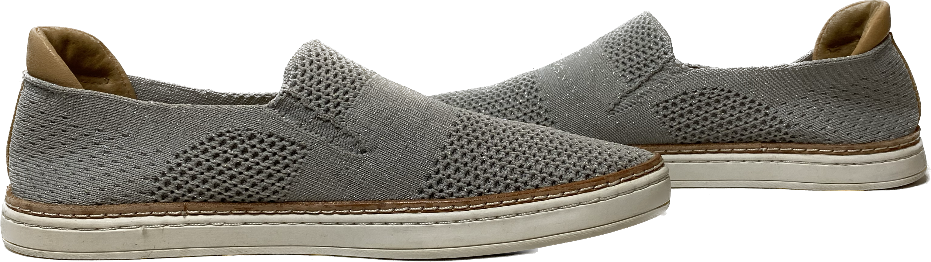 Ugg Grey Sammy Slip-OnsThese stretch knit slip-ons have just the right amount of sparkle subtly woven in. 
Great shoes for casual weekend wear!Ugg Grey Sammy Slip-OnsShoes