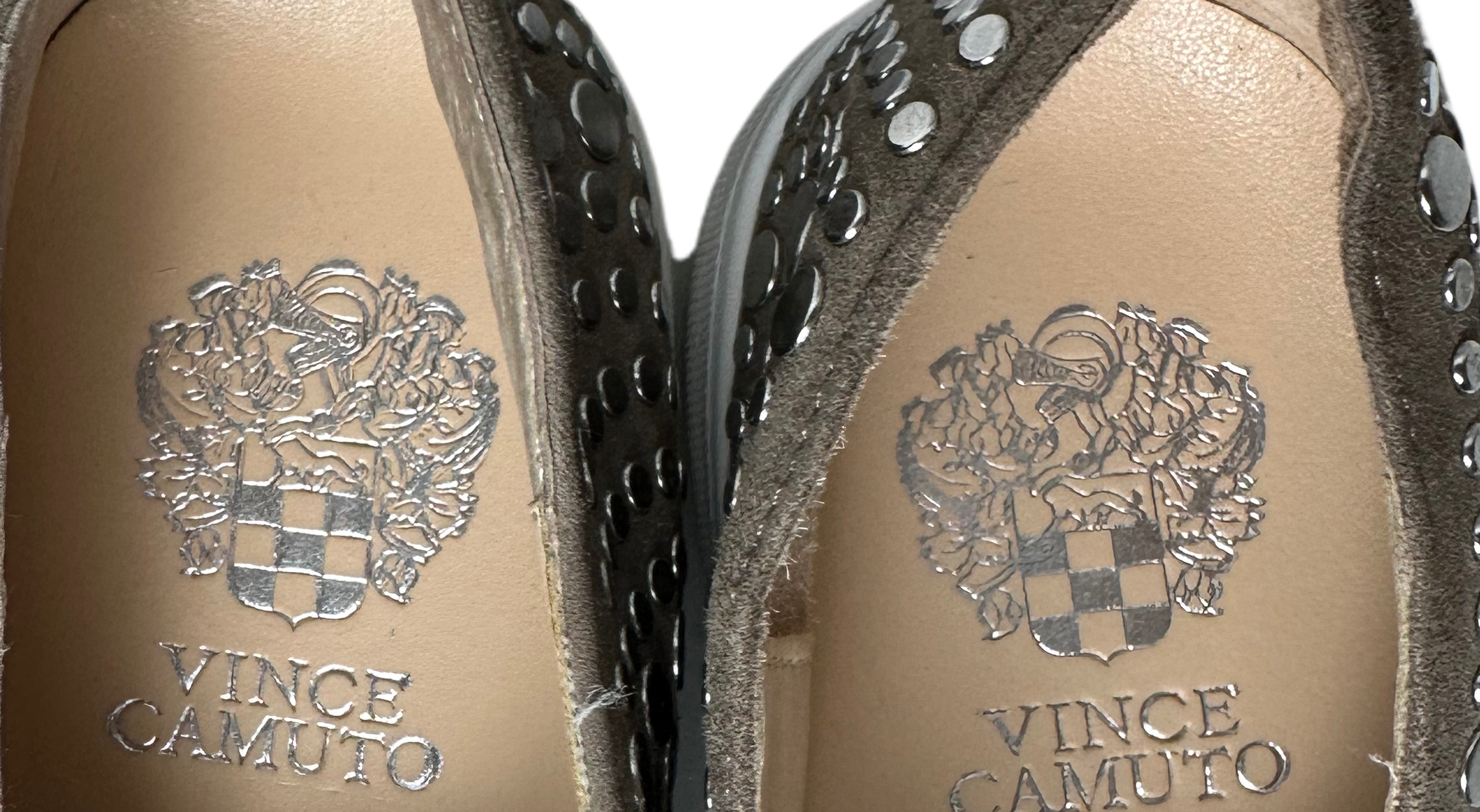 Vince Camuto Silver Studded Beige Leather Slip On Platform SneakersTake your style to the next level with these Vince Camuto studded beige leather slip-on platform sneakers. With a bold approach to design and a daring attitude, thesVince Camuto Silver Studded Beige Leather SlipShoes