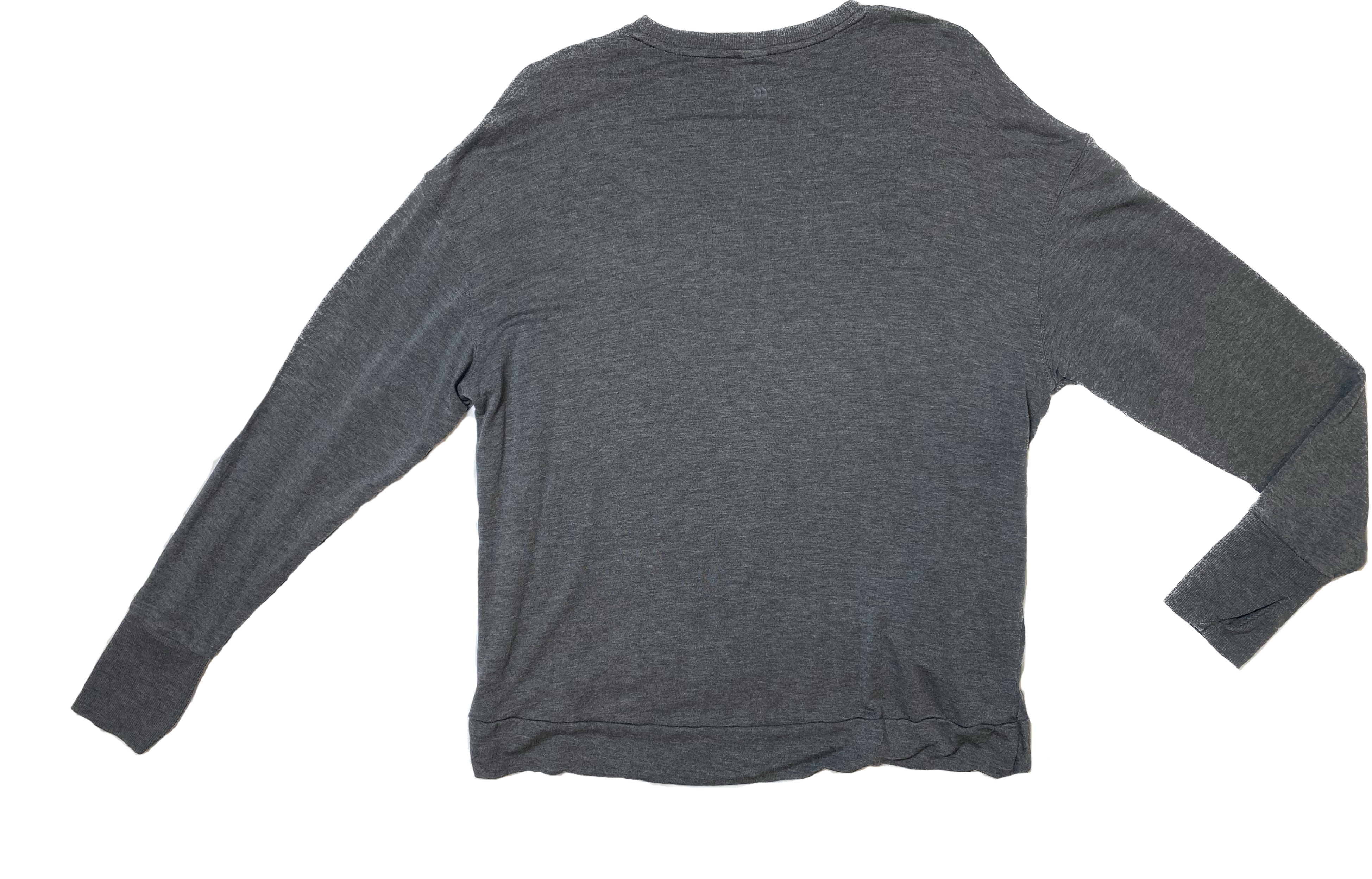 All In Motion Grey Long Sleeve Side Knot TopThis soft and cozy top will help keep you warn with added thumb holes on the cuffs!
Add style to a casual outfit with this side knotted top. Easy to wear with jeans Motion Grey Long Sleeve Side Knot TopShirts & Tops