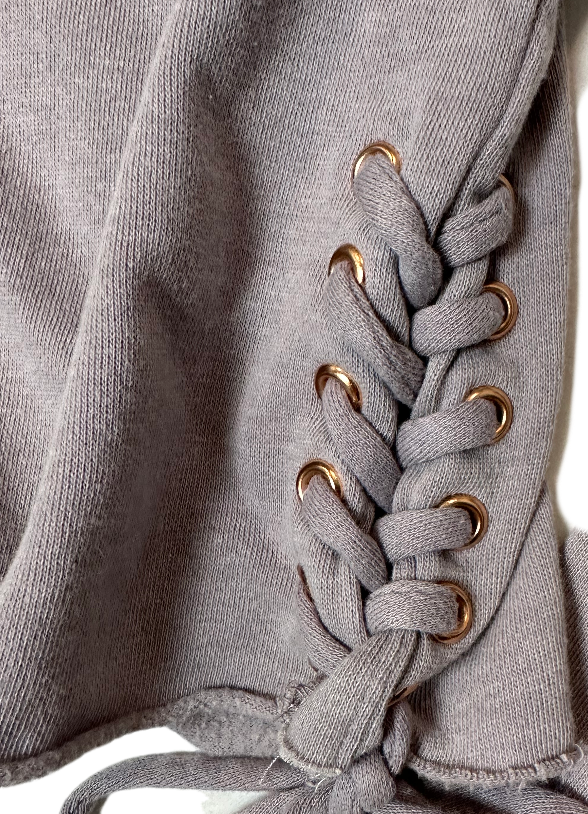 Mossimo Cropped Hoodie with Side Lace-up Detail and Raw HemThe side lace-up detailing on this muted lavender cropped hoodie is so cute! Through a   t-shirt under this and you can wear this year round.