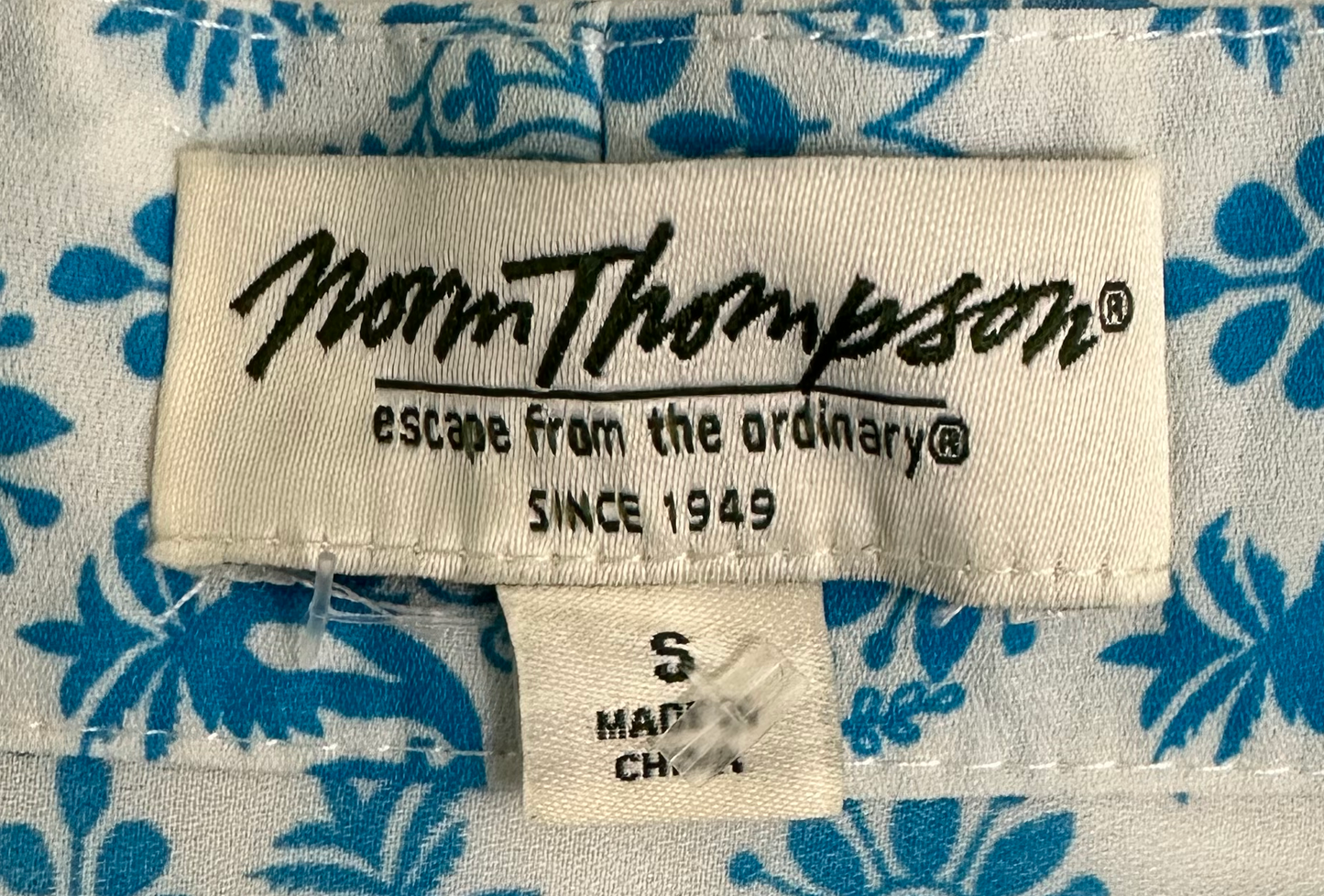 Norm Thompson Short Sleeve Printed KimonoWrap yourself up in sunny vibes with this Norm Thompson short sleeve printed kimono! Feel free to flaunt your style with the bright colors and printed pattern, breezNorm Thompson Short Sleeve Printed KimonoTops