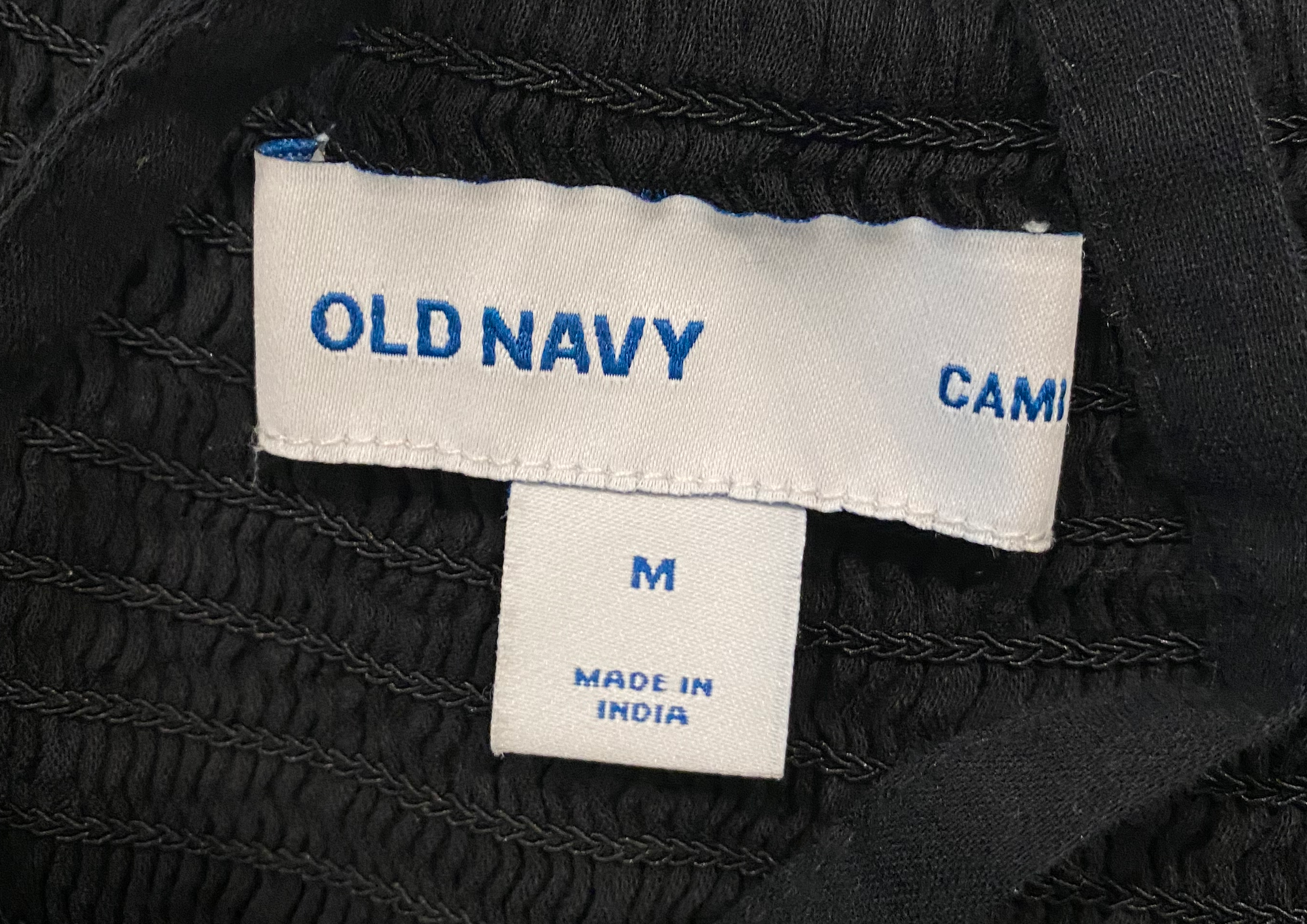 Old Navy Black Cami Sundress Time to update your little black sundress! This dress has it all....spaghetti straps, elastic back, lining, AND POCKETS! Not only will you look fabulous in this, but