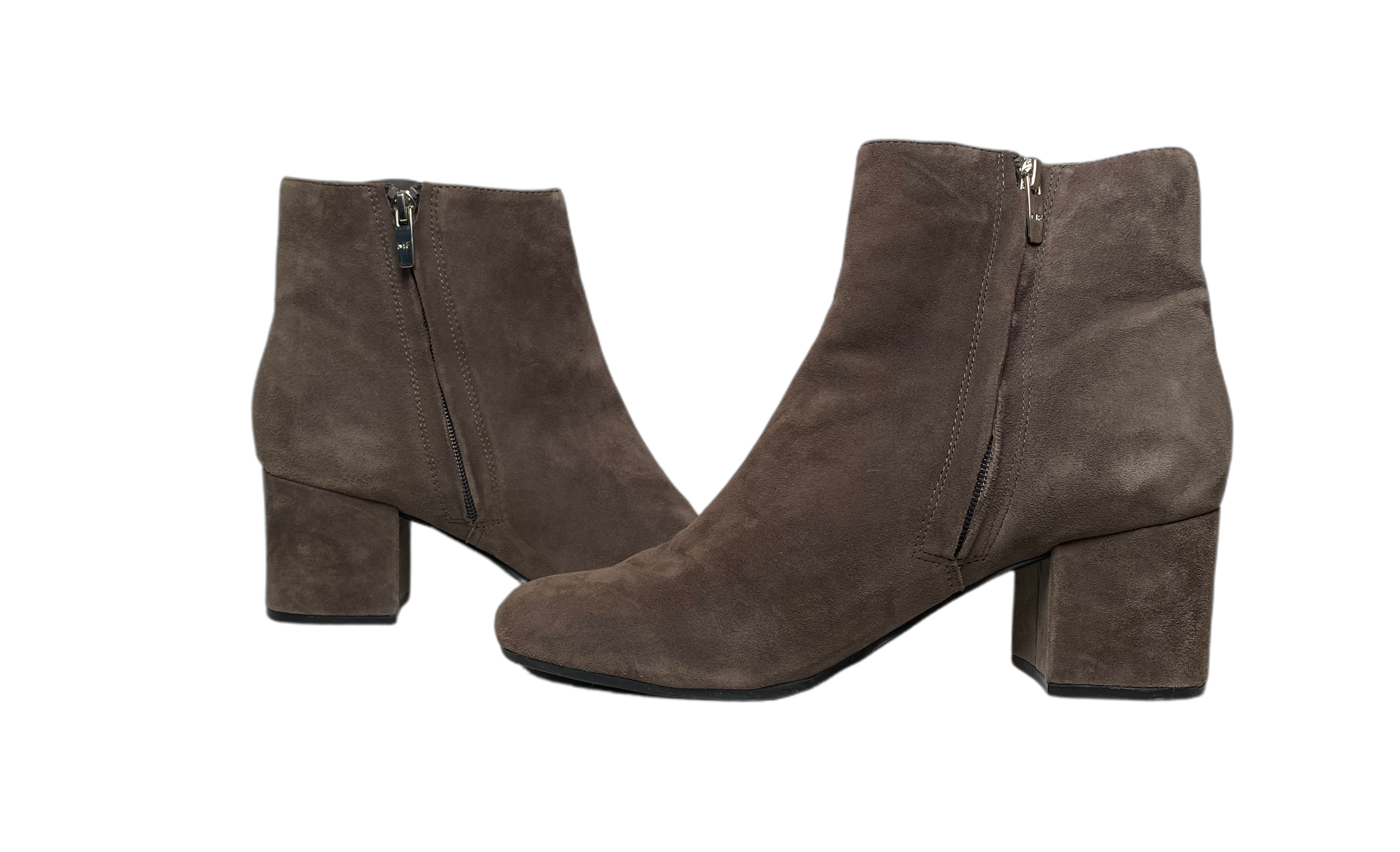 Marc Fisher Tan Suede Ankle BootsBeautiful tan suede boots with side zip and suede covered heel.
These stylish boots will pair with your jeans or tights and dress for a cozy Fall look.Marc Fisher Tan Suede Ankle BootsShoes