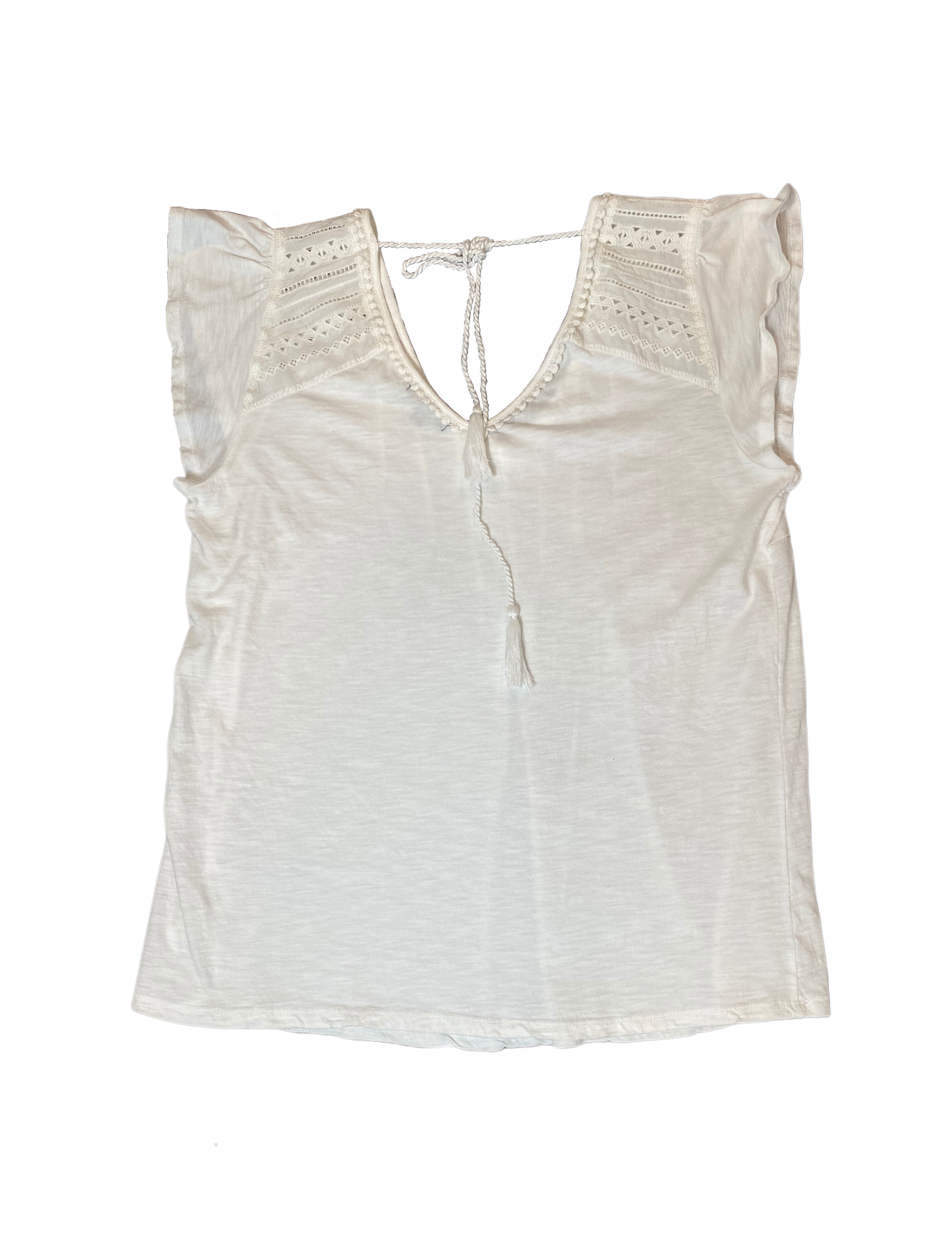 Democracy White V-Neck Cap Sleeve Top The perfect little white top! V neck in the front and back with a tie across the back. Thoughtful details make this the iconic top for Summer!!