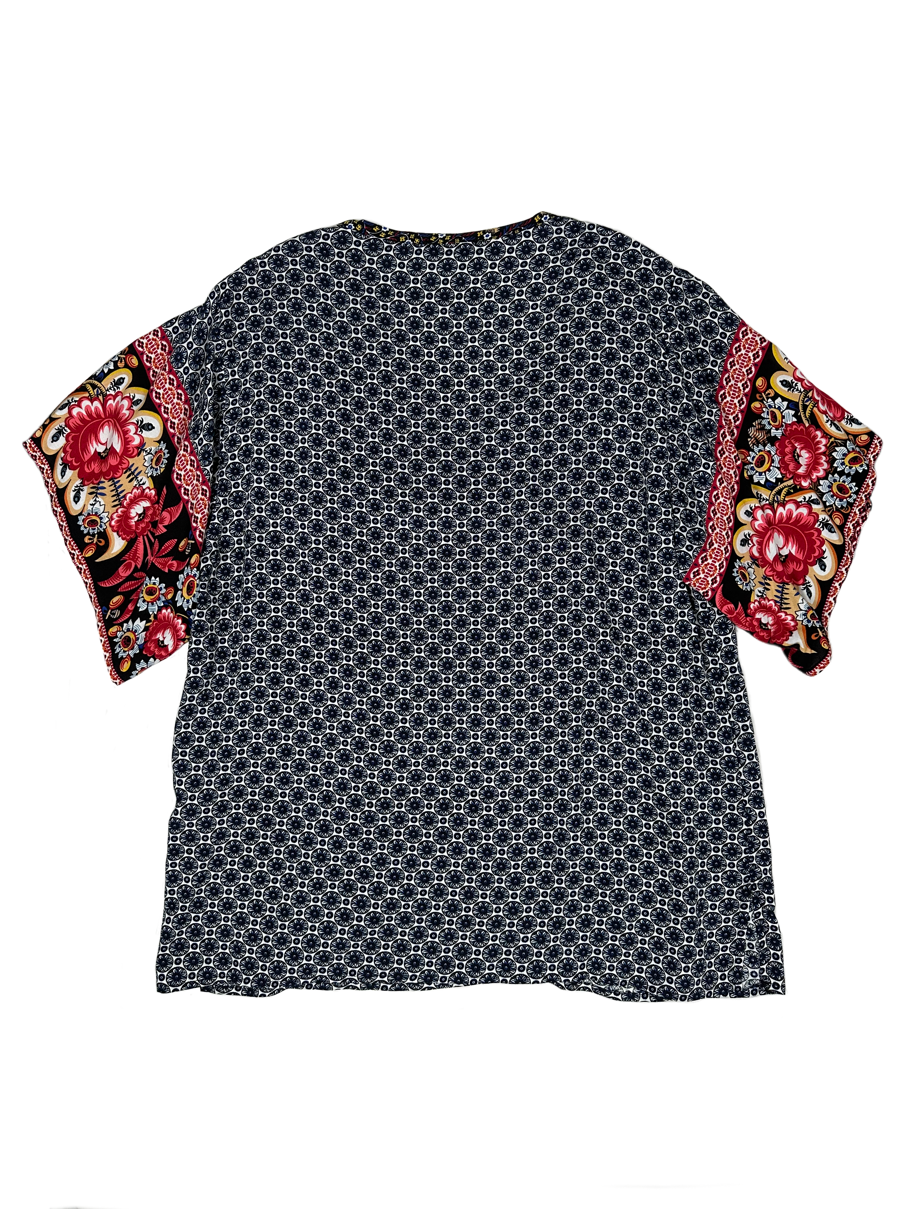 Weekend by Suzanne Betro Printed Short Sleeve Blouse Freshen up your look with this weekend-ready top from Suzanne Betro! Its light rayon fabric and playful print will be sure to make a statement. And don’t forget the 