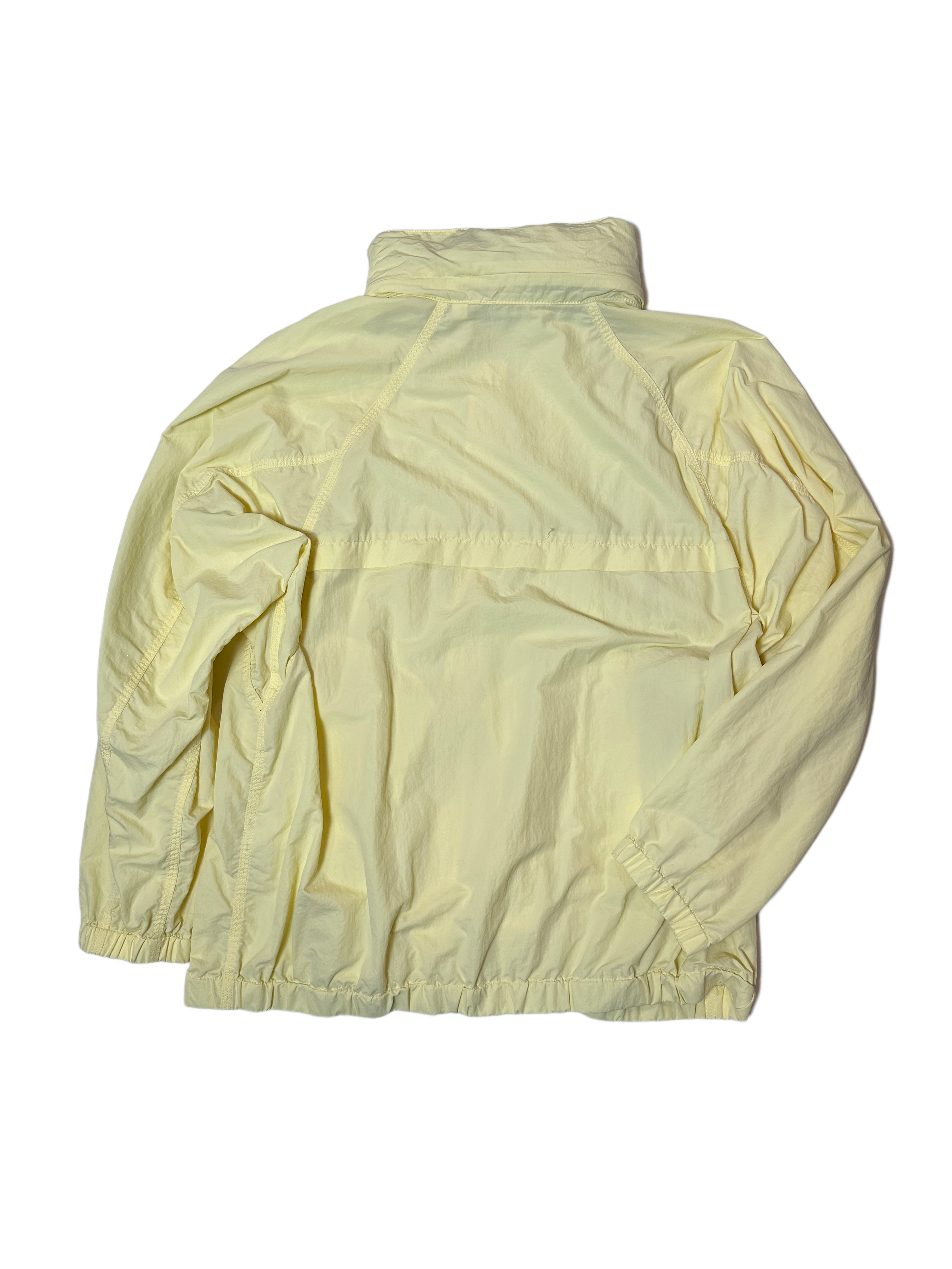 Uniqlo Yellow Windbreaker with Hood in CollarThis is so light weight, it's great for packing or tossing in your purse for a day out. Wear with or with out the easy to roll away hood.Uniqlo Yellow WindbreakerCoats & Jackets